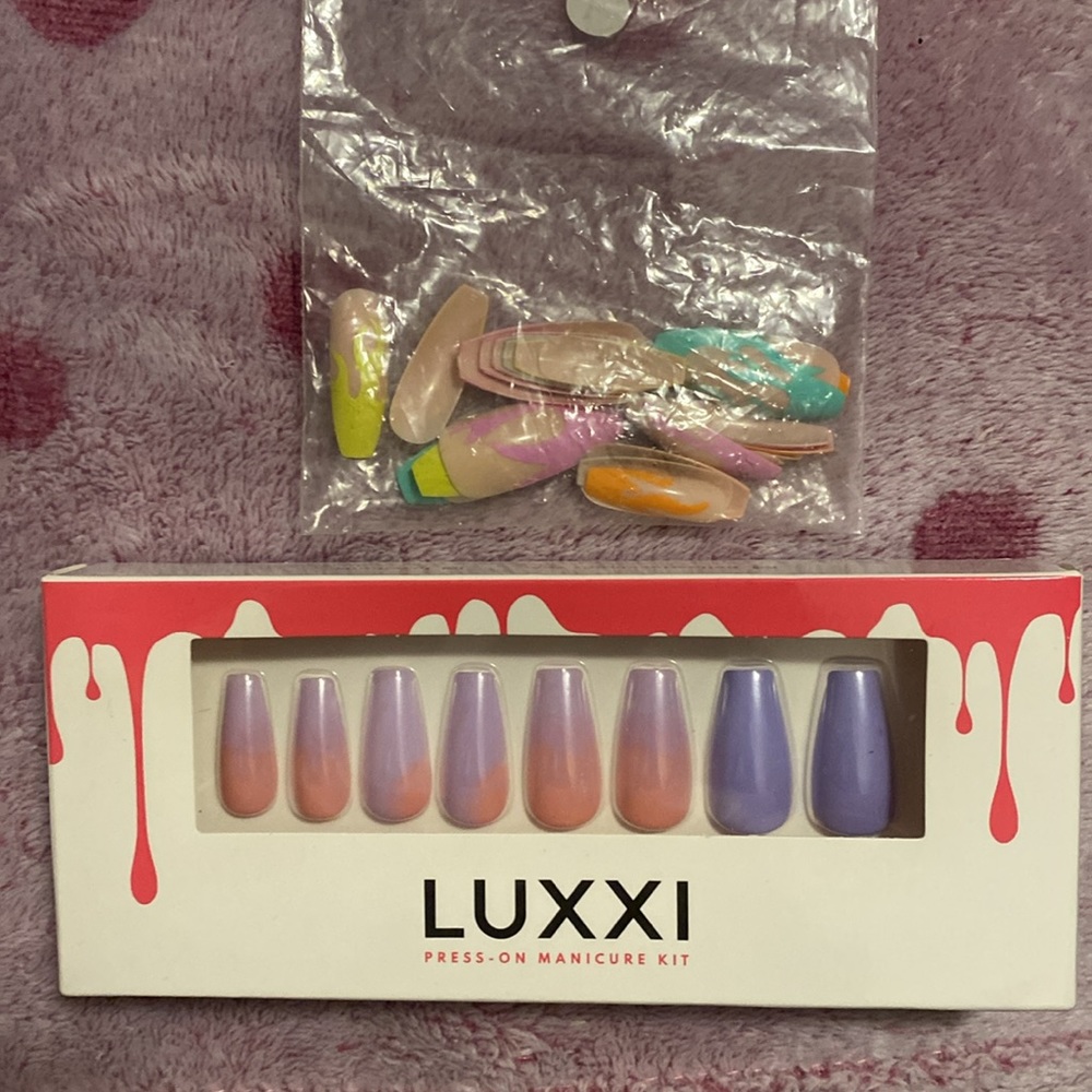 Luxxi pink and purple nails and Clutch colorful flames nails